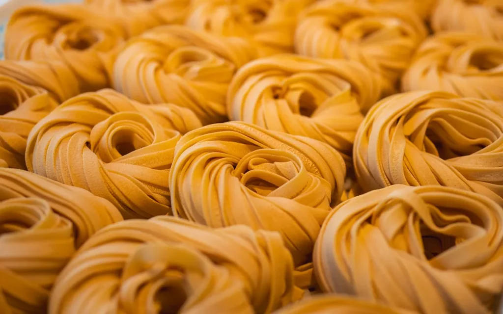 Close-up view of homemade fettuccine pasta nests